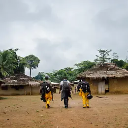 Three men are waking