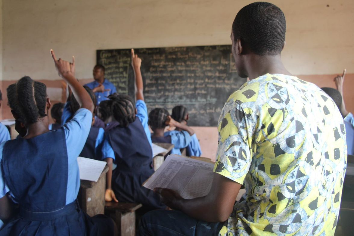 Teacher with students 